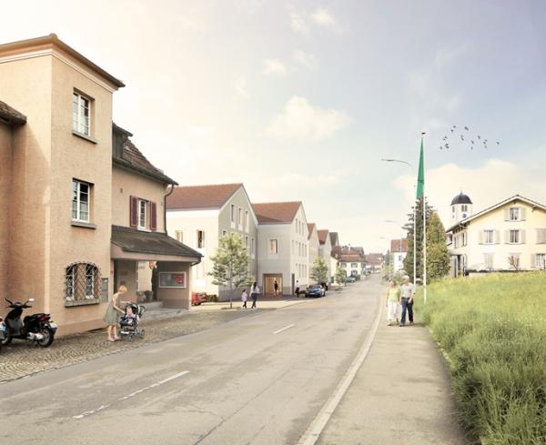 Visualisierung des Bauprojekts in Häggenschwil mit modernen Wohngebäuden an einer Dorfstrasse.